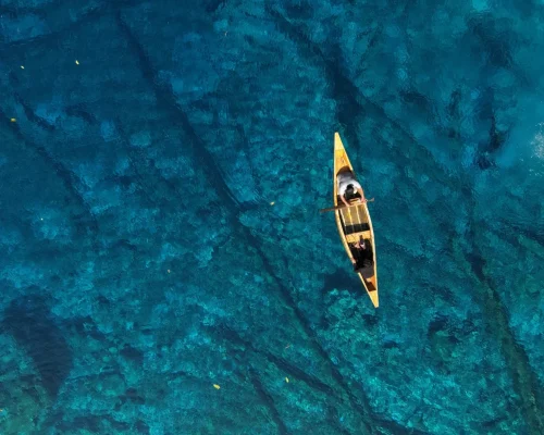Aerial view of kayak at Paisupok Lake Banggai Central Sulawesi