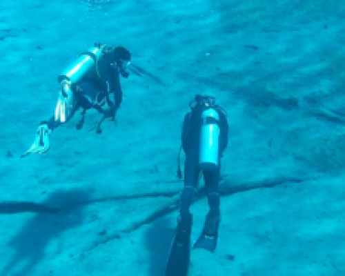 Scuba diving at Pulau Dua Balantak Banggai crystal clear waters